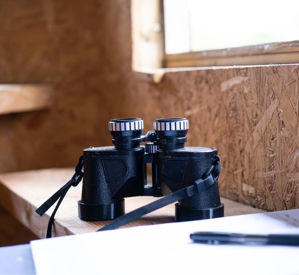 Pair of binoculars on desk