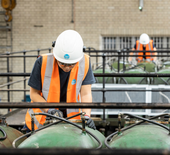 Technicians working at a pumping station