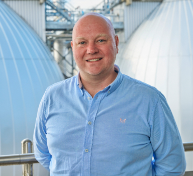 A Thames Water digital colleague smiles at the camera
